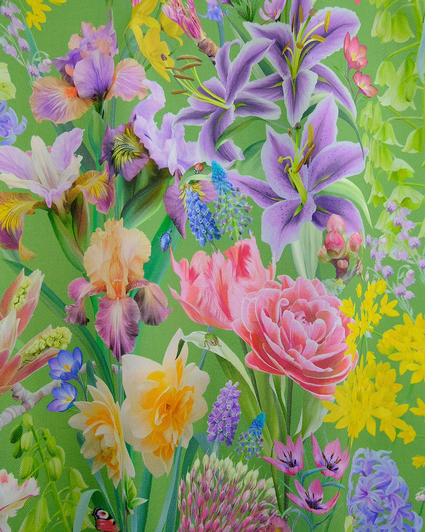 Uplifting conscious material in a bright flowering lush green design for modern soft furnishings and window coverings