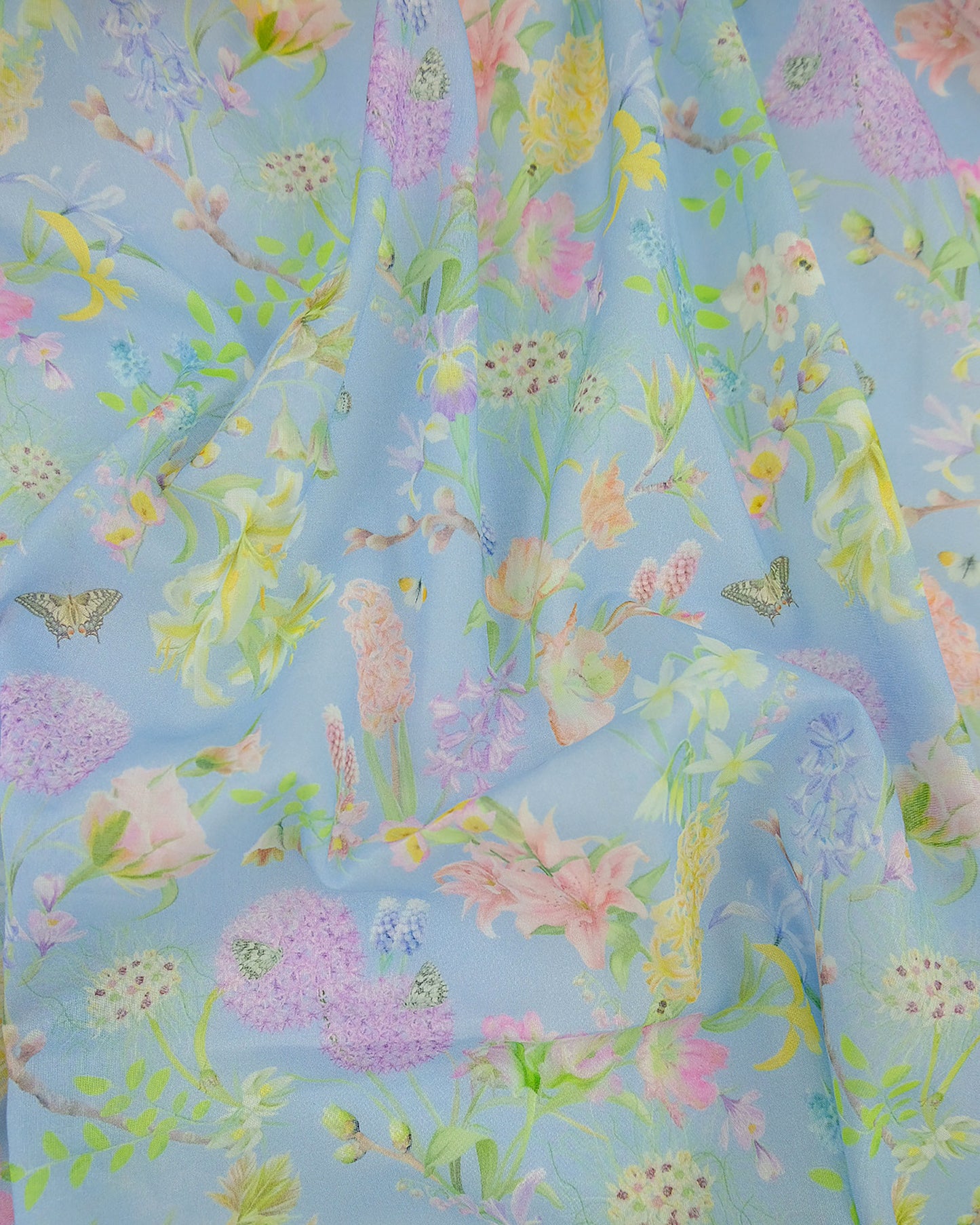 Relaxing blue see through material in a luxury botanical design for costal cottage interior inspiration