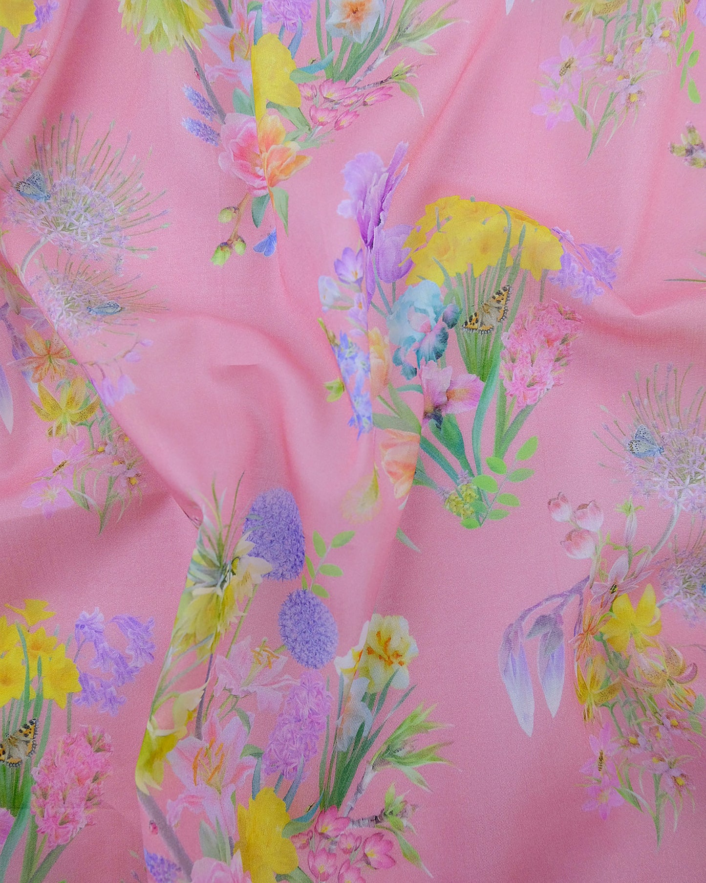 Transparent organic textile in a designer nature inspired bold pink print for window coverings