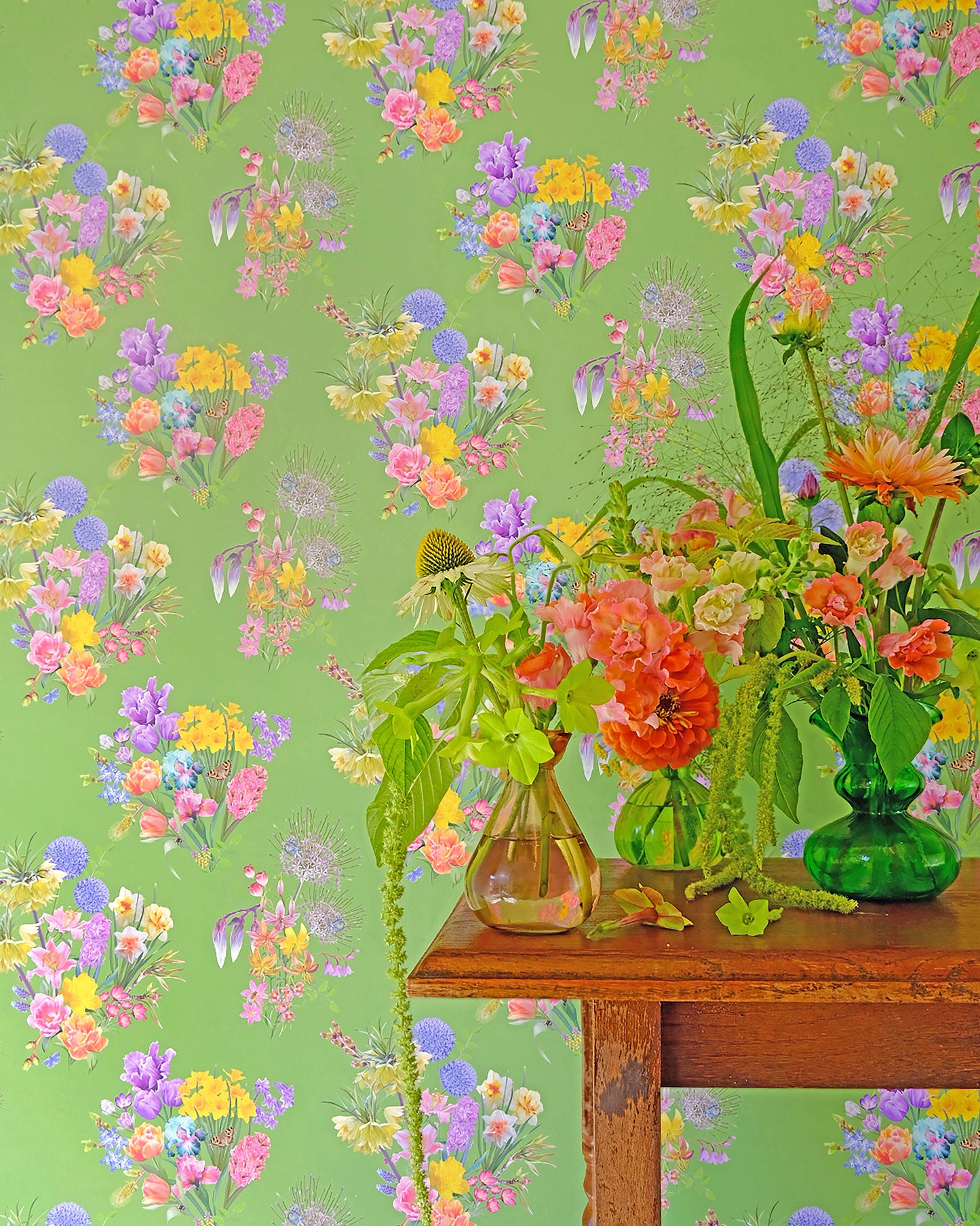 Colourful luxury wallpaper in bright green with a spring floral pattern for traditional cottage interiors