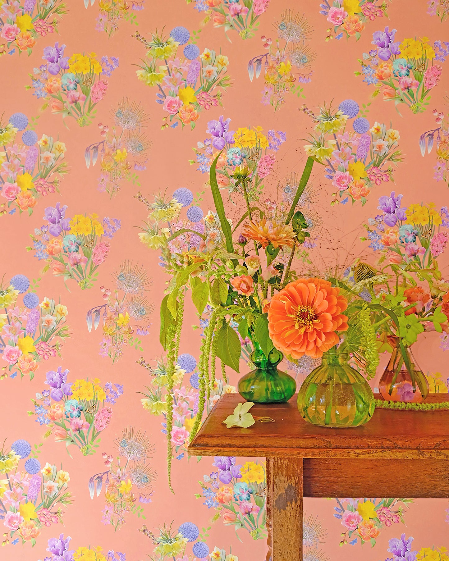 Colourful luxury wallpaper in pale orange with a spring floral pattern for traditional cottage interiors