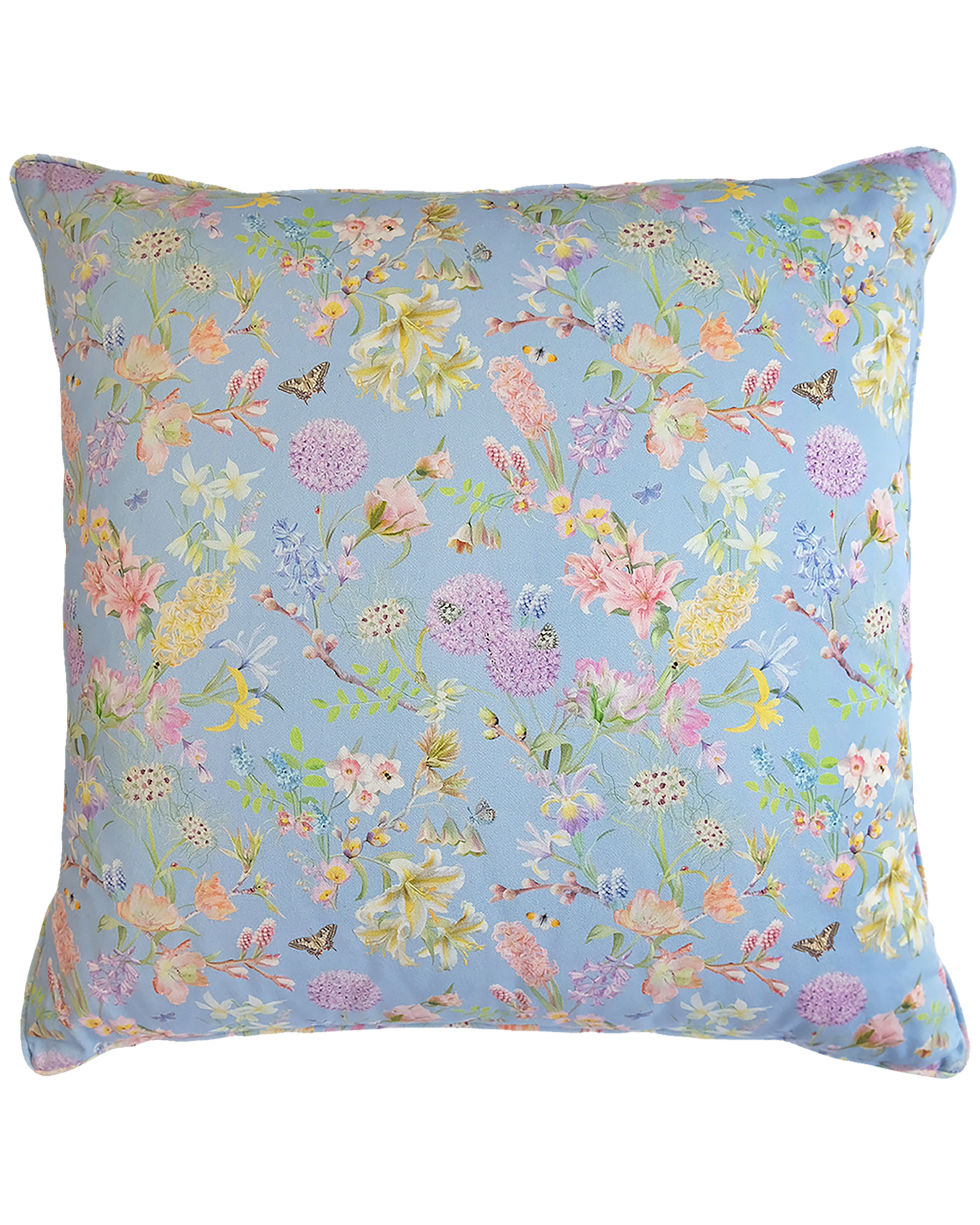 pastel blue organic cotton cushion with a floral pattern and piped embellishment