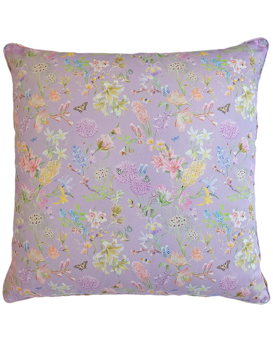 pale lilac relaxing cushion with a delicate floral hand drawn print in organic cotton