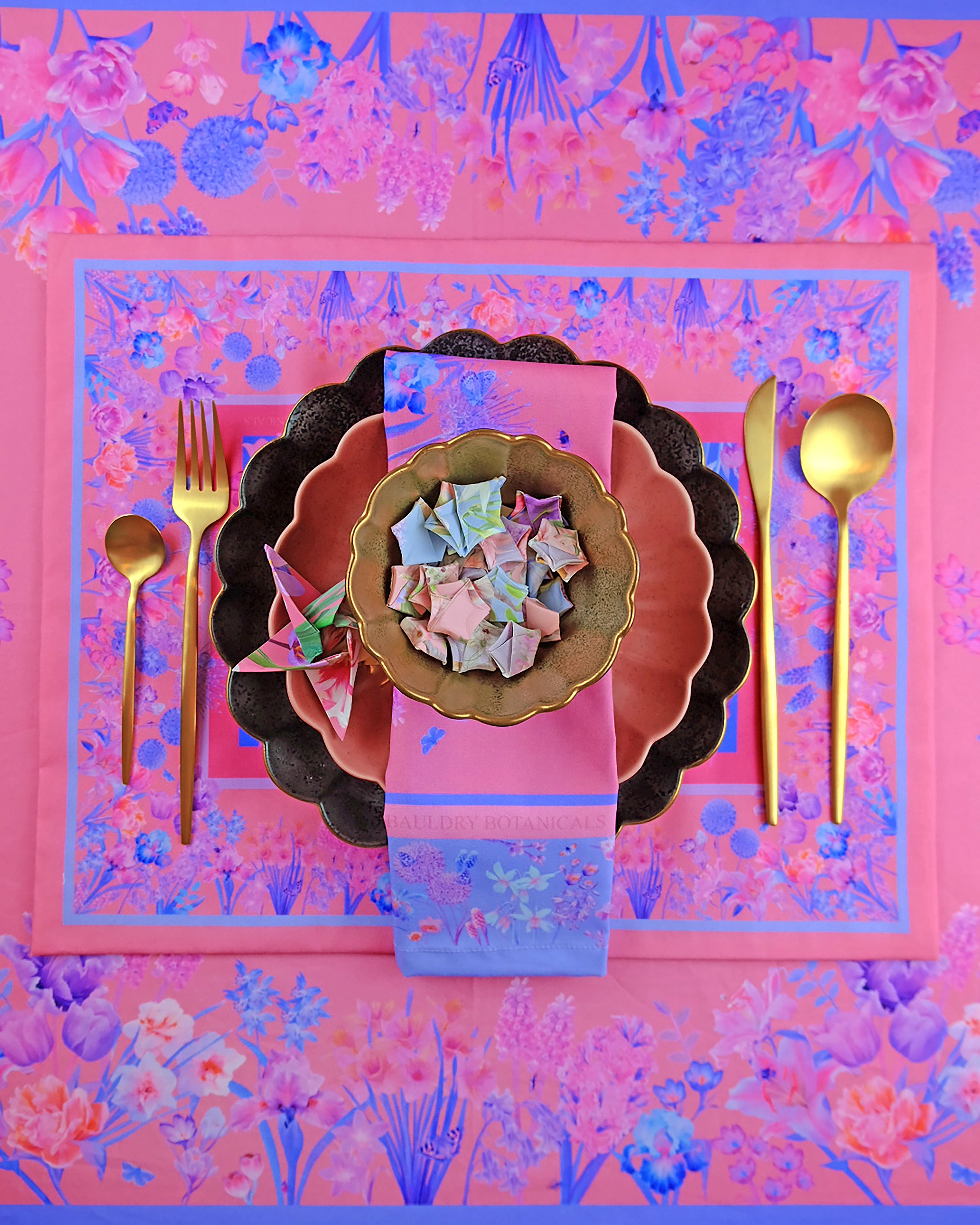 place settings for a dinner party in pink and blue with designer floral prints by bauldry botanicals