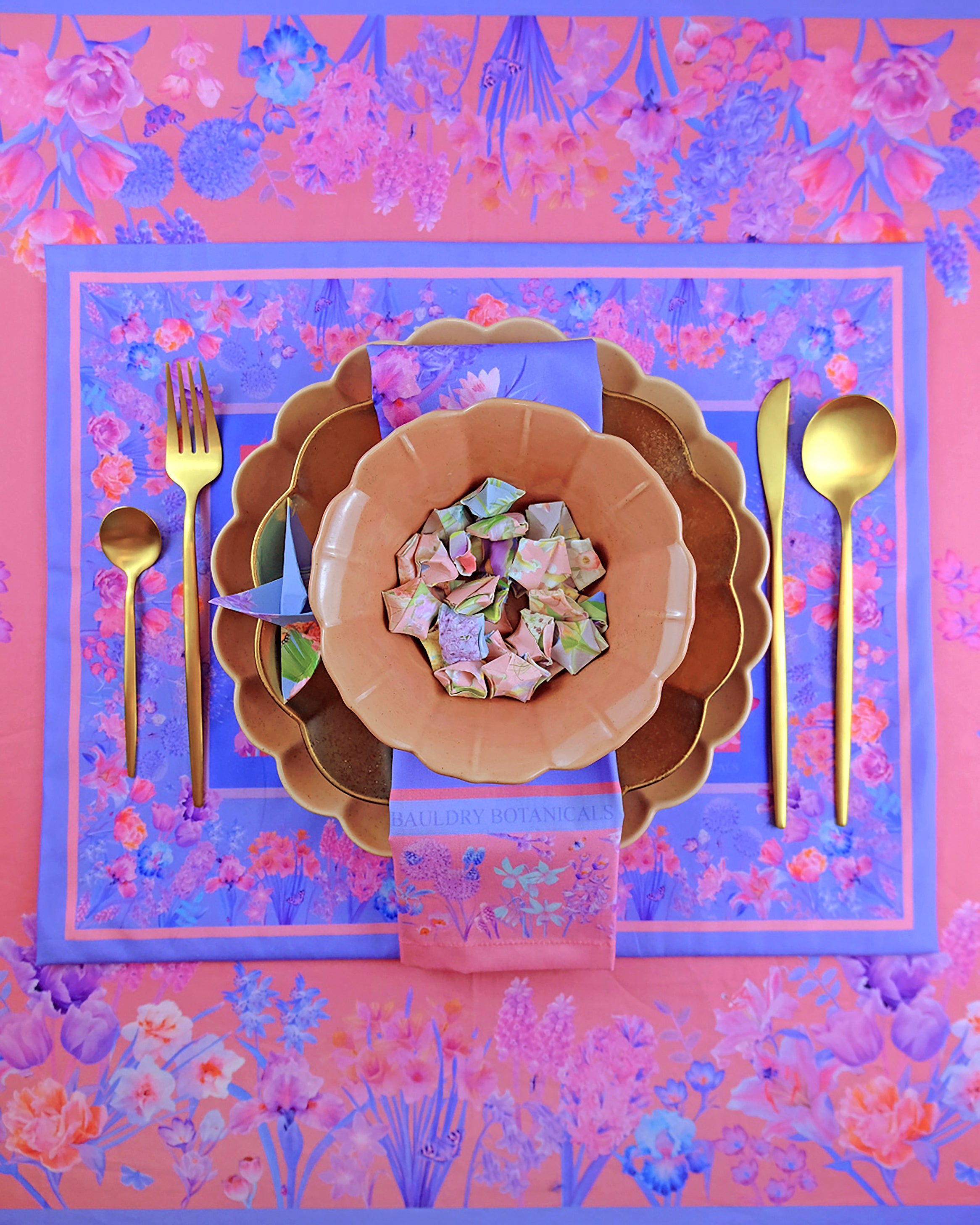 place settings for a dinner party in pink and blue with designer floral prints by bauldry botanicals