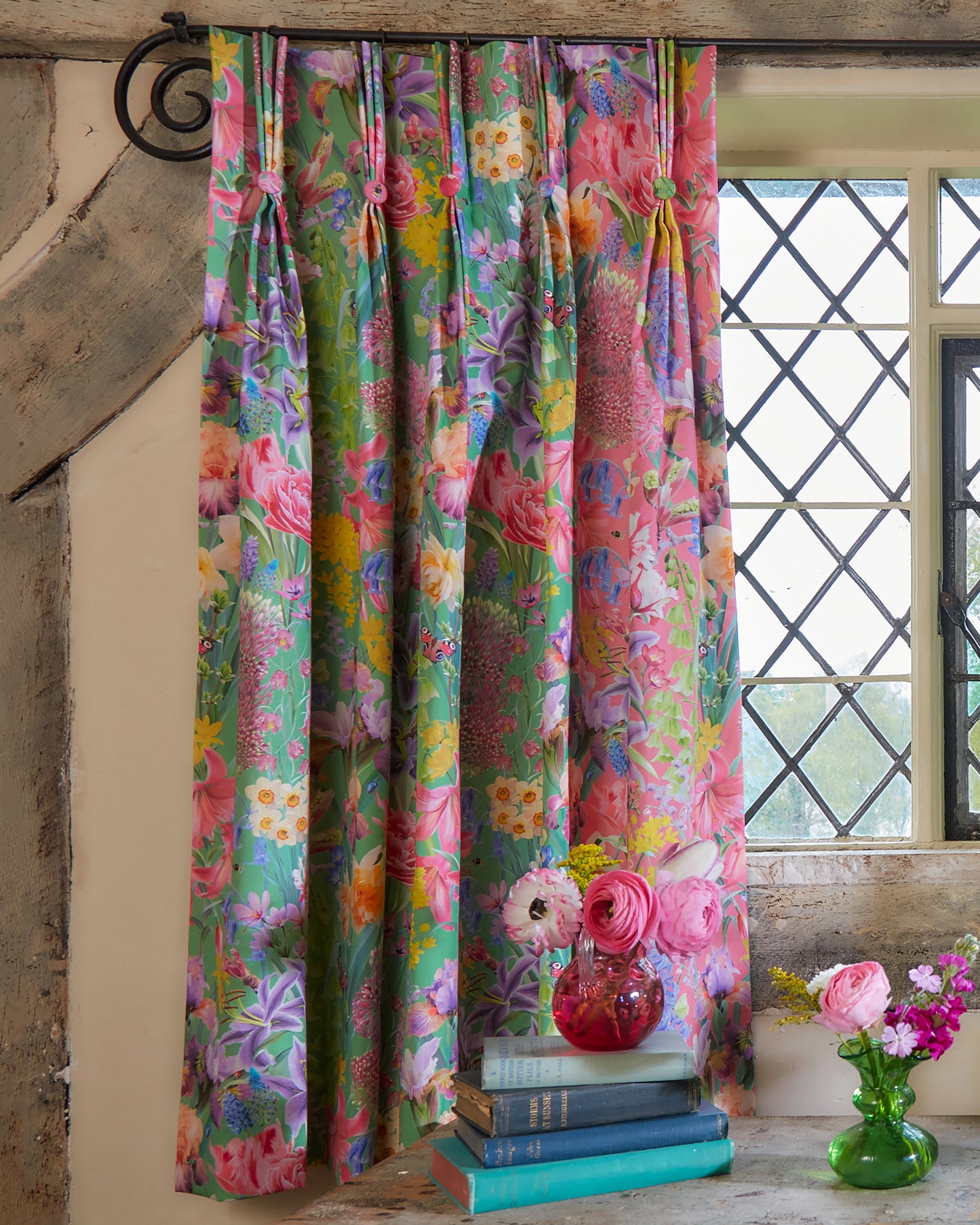 Sustainable curtain made by Bauldry Botanicals in burst into bloom organic cotton twill in green and pink with pinch pleats