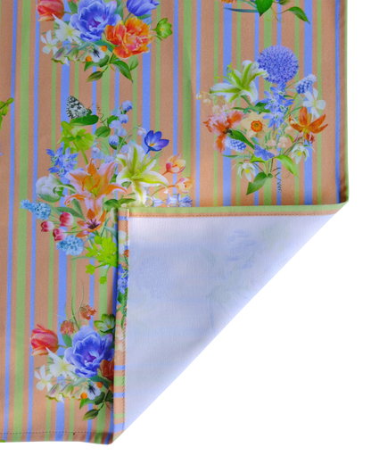 Floral patterned fabric napkin with colourful flowers and stripes on a orange background