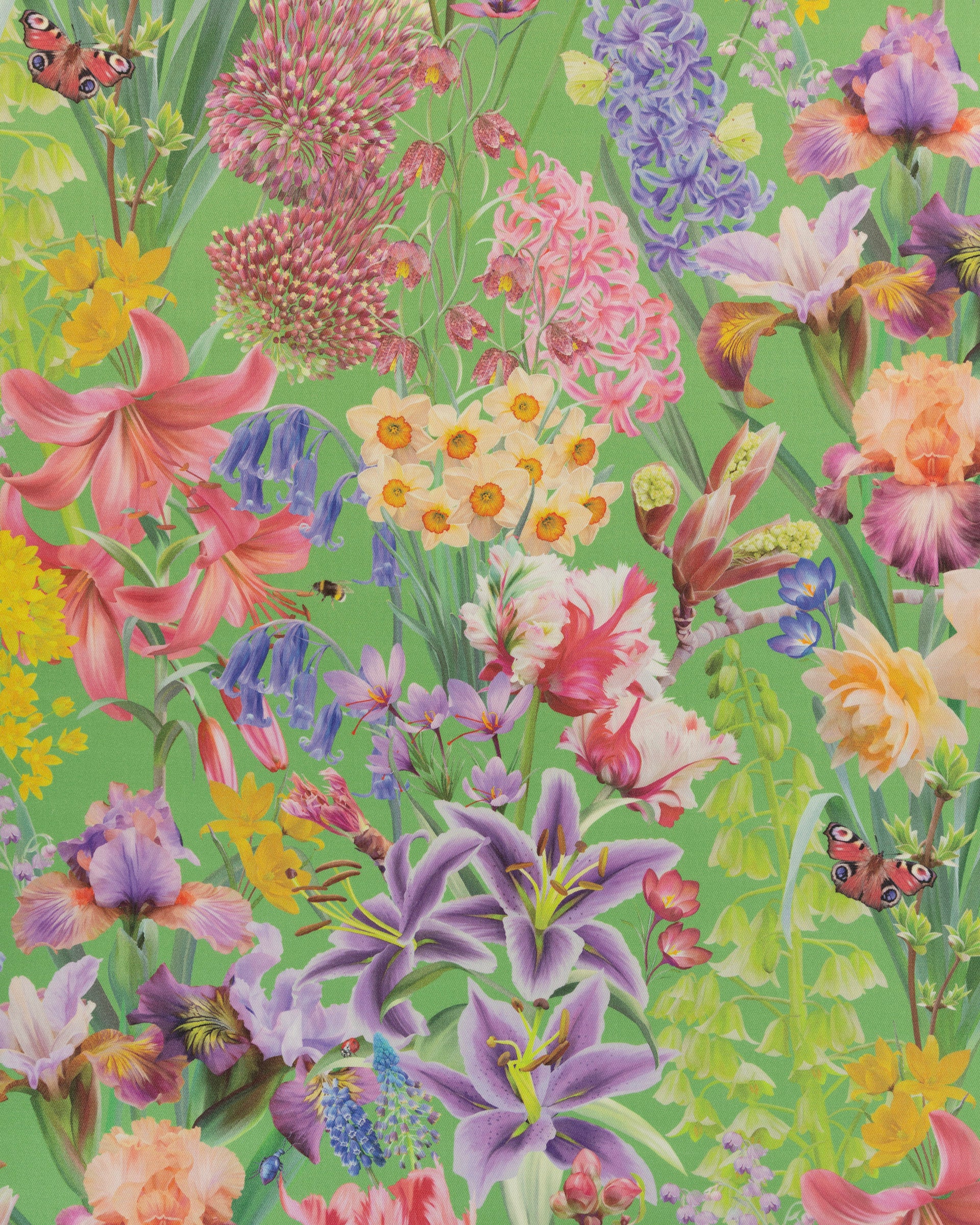 Burst Into Bloom Green cotton twill furnishing fabric in vibrant plum showing detailed botanical floral pattern for curtains and cushions.