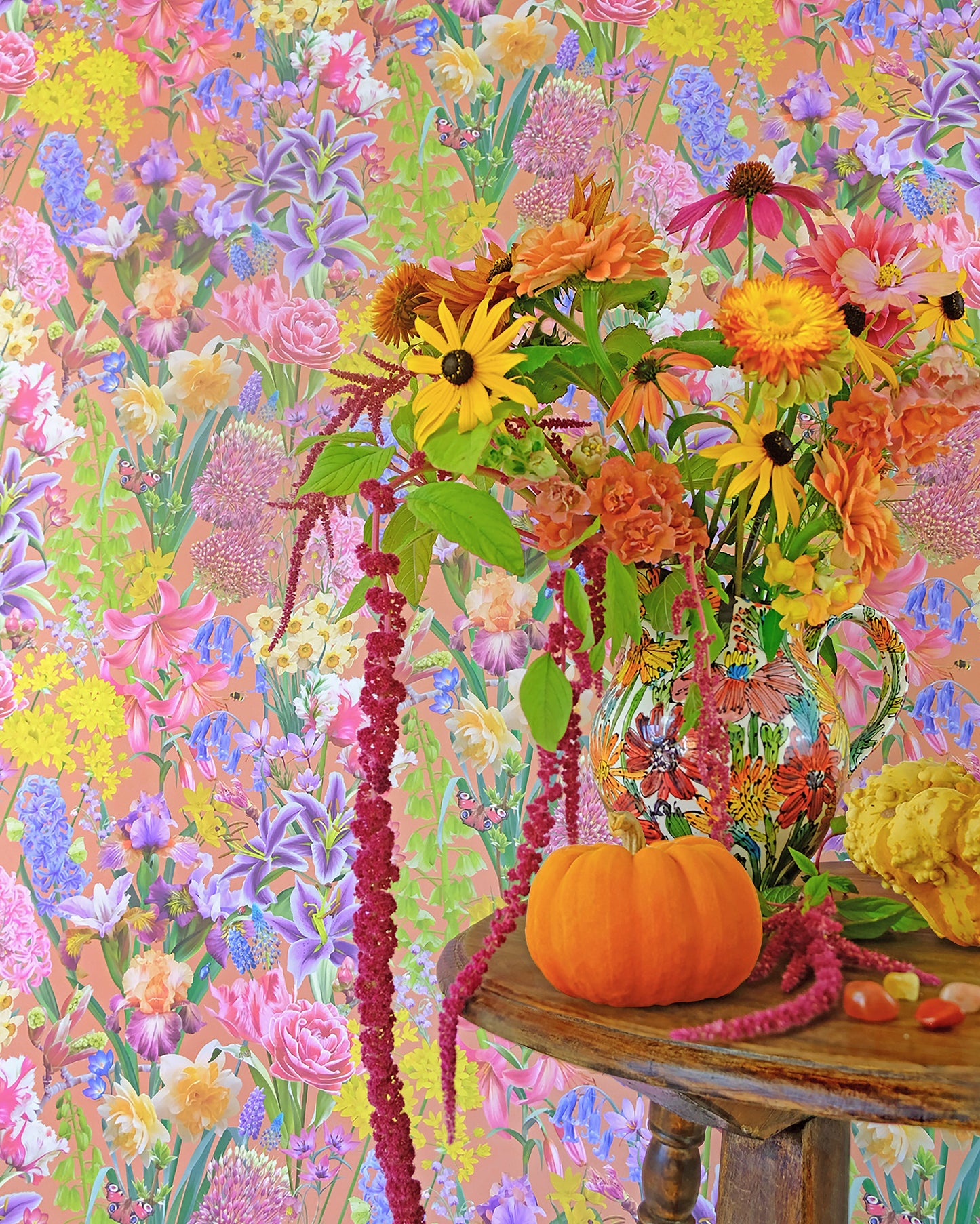 Colourful luxury wallpaper in bright peach with a spring floral pattern for cottage interiors