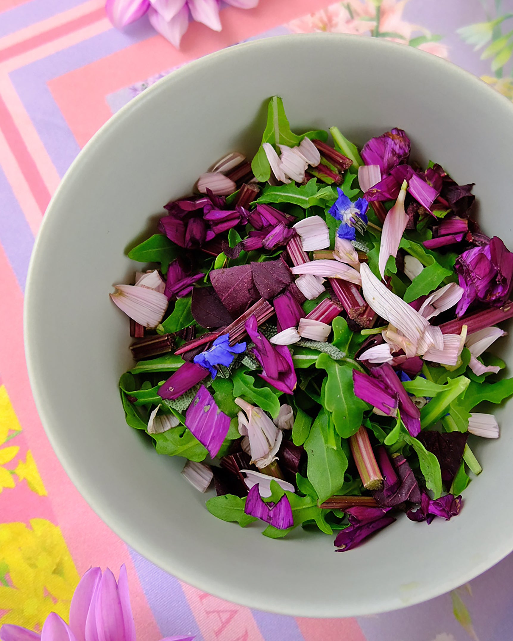 edible flowers, medicinal herbs and organic leaves to create a colourful healthy salad
