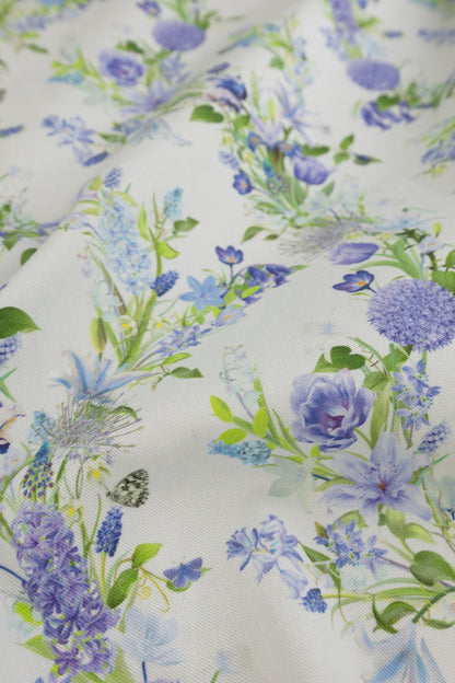 Eternal Drift Glacial Mist blue organic cotton gabardine floral fabric close up showing woven texture detail