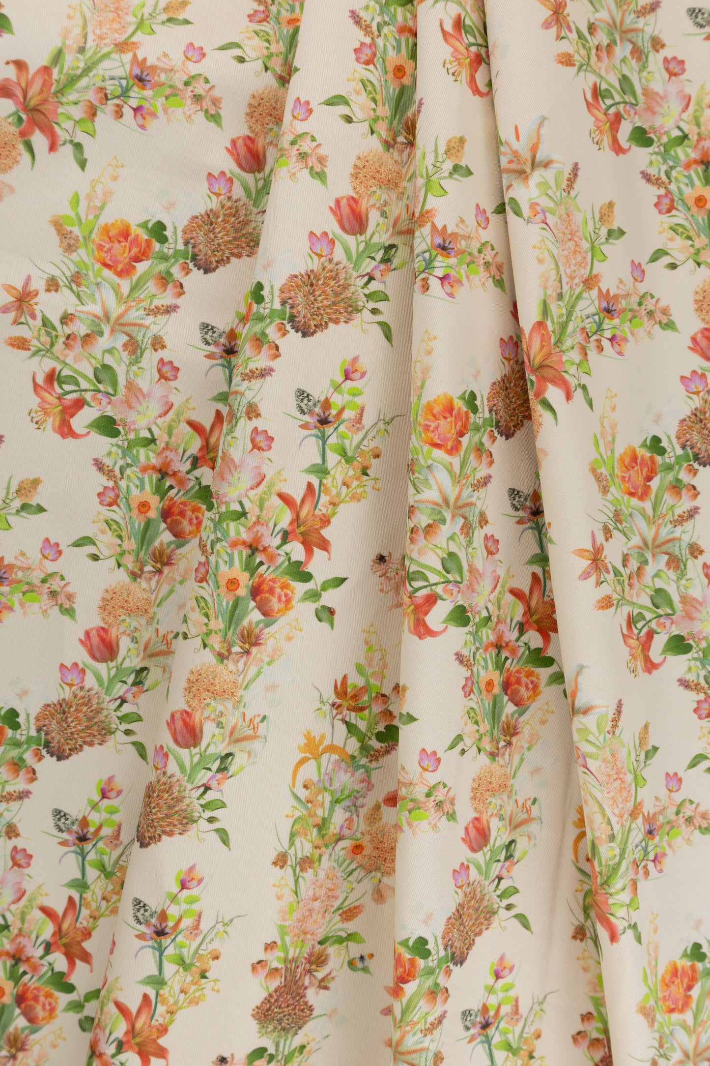 Eternal Drift Veiled Ember orange fabric folded to show structure and thickness