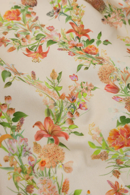 Eternal Drift Veiled Ember orange organic cotton gabardine floral fabric close up showing woven texture detail