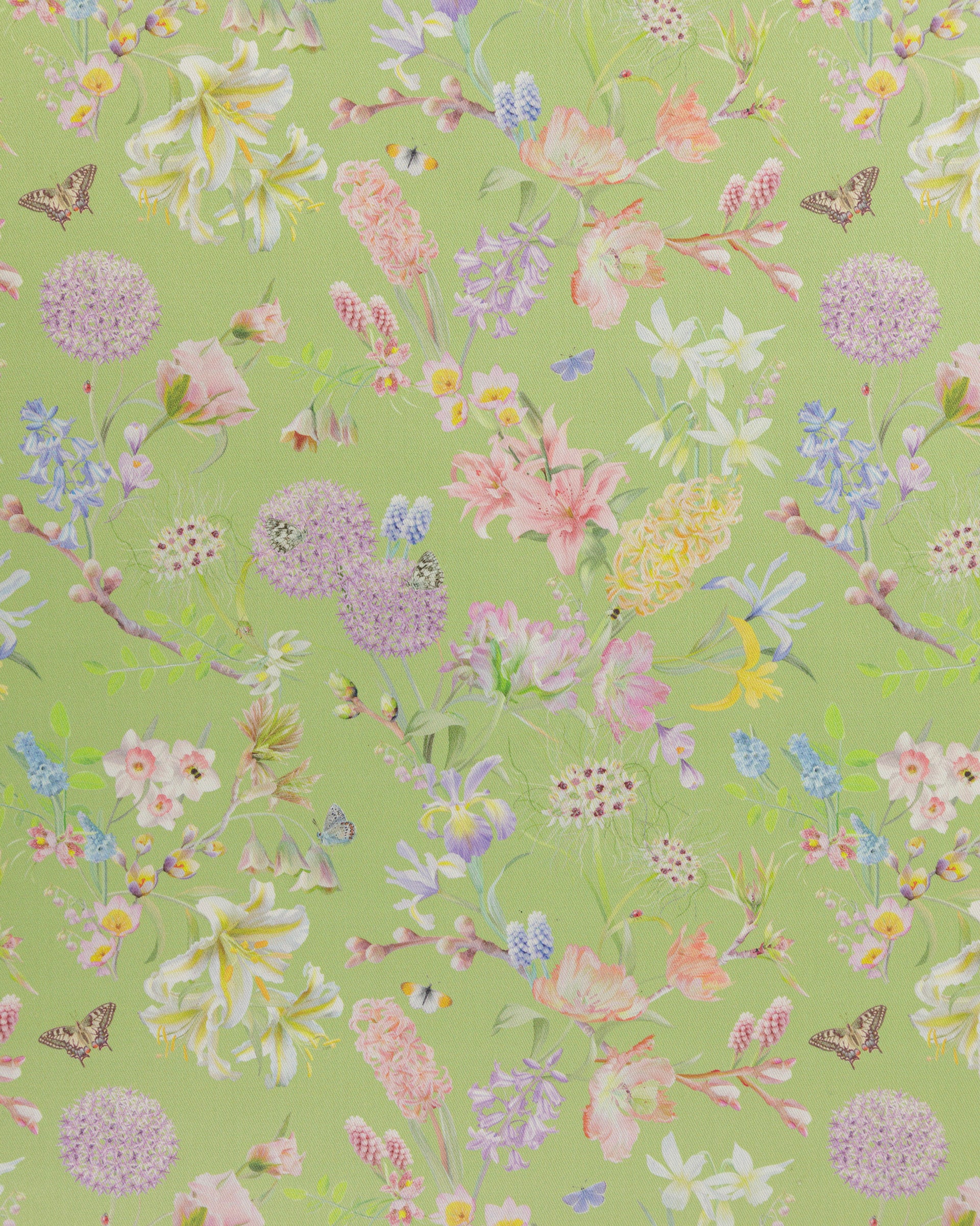 Hopeful Beginnings fabric in green featuring hand drawn English garden flowers including daffodils, Lillies and iris on a soft green background.