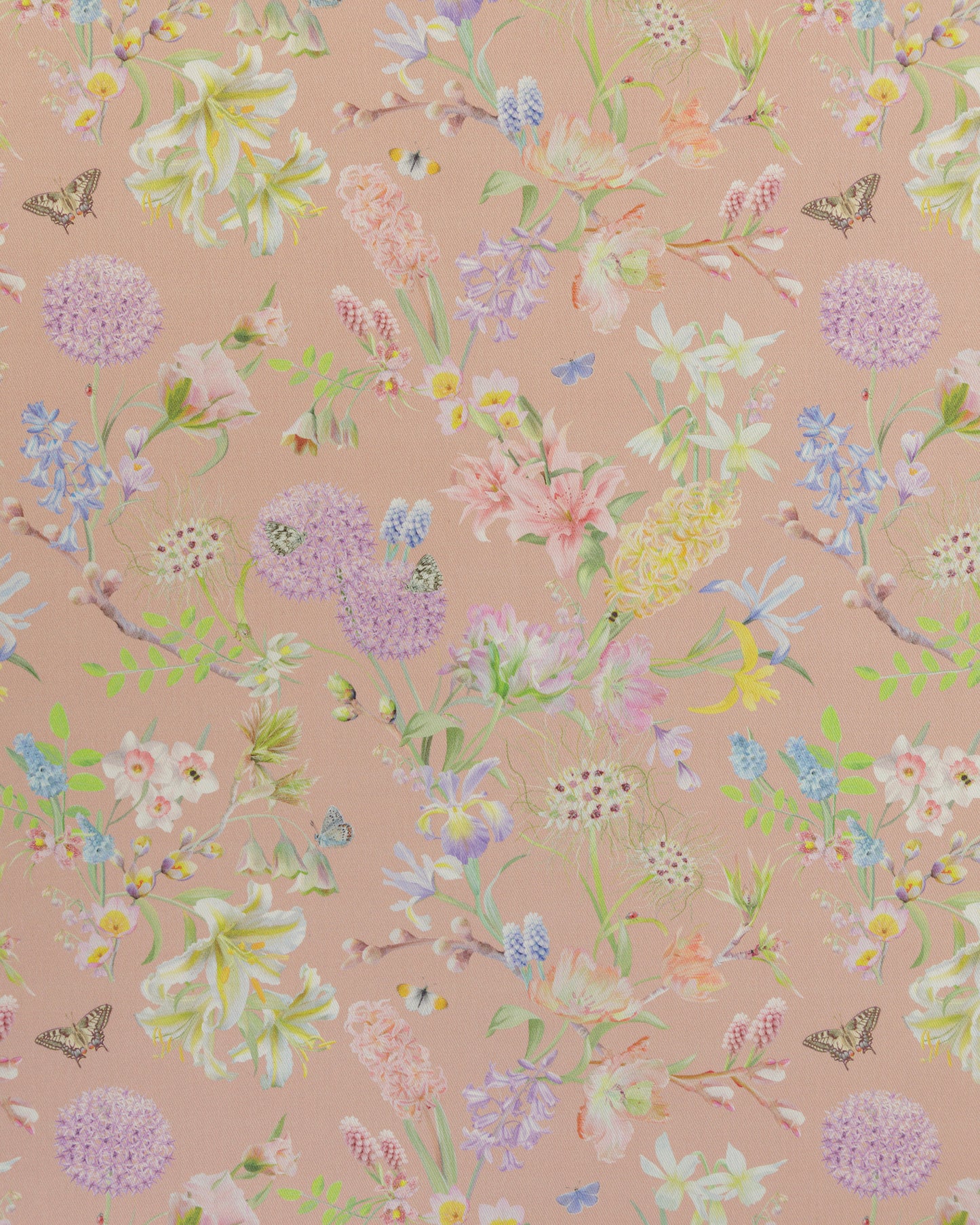 Hopeful Beginnings fabric in peach featuring hand drawn English garden flowers including daffodils, Lillies and tulips on a soft beige background.