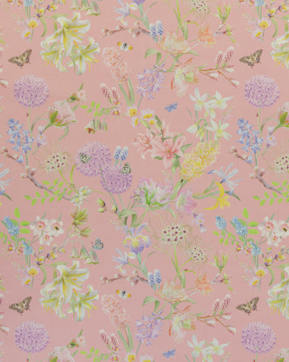Hopeful Beginnings fabric in pink featuring hand drawn English garden flowers including daffodils, tulips and crocus on a soft pink background.