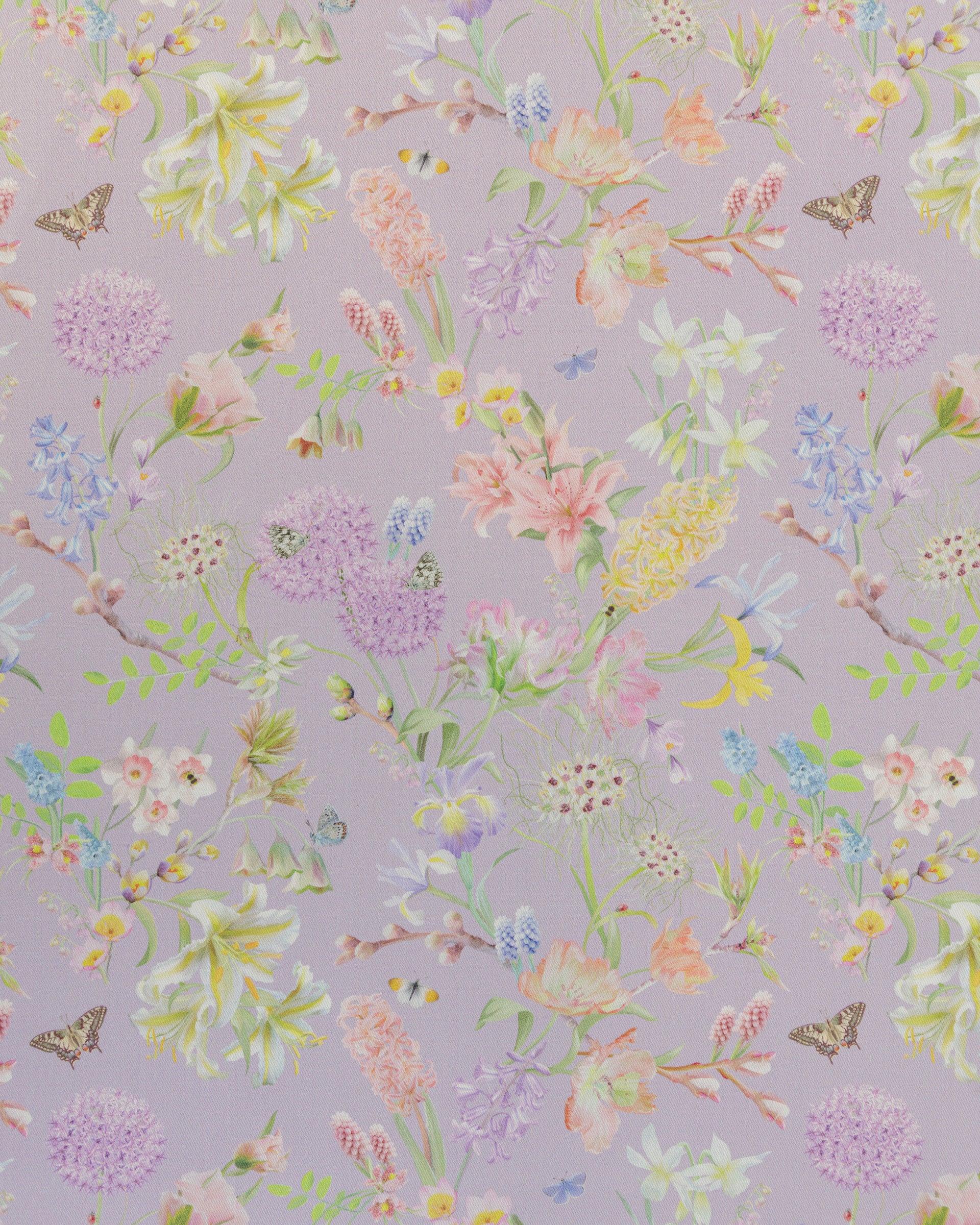 Hopeful Beginnings fabric in light purple featuring hand drawn English garden flowers including hyacinths, Lillies and alliums on a soft lavender background.