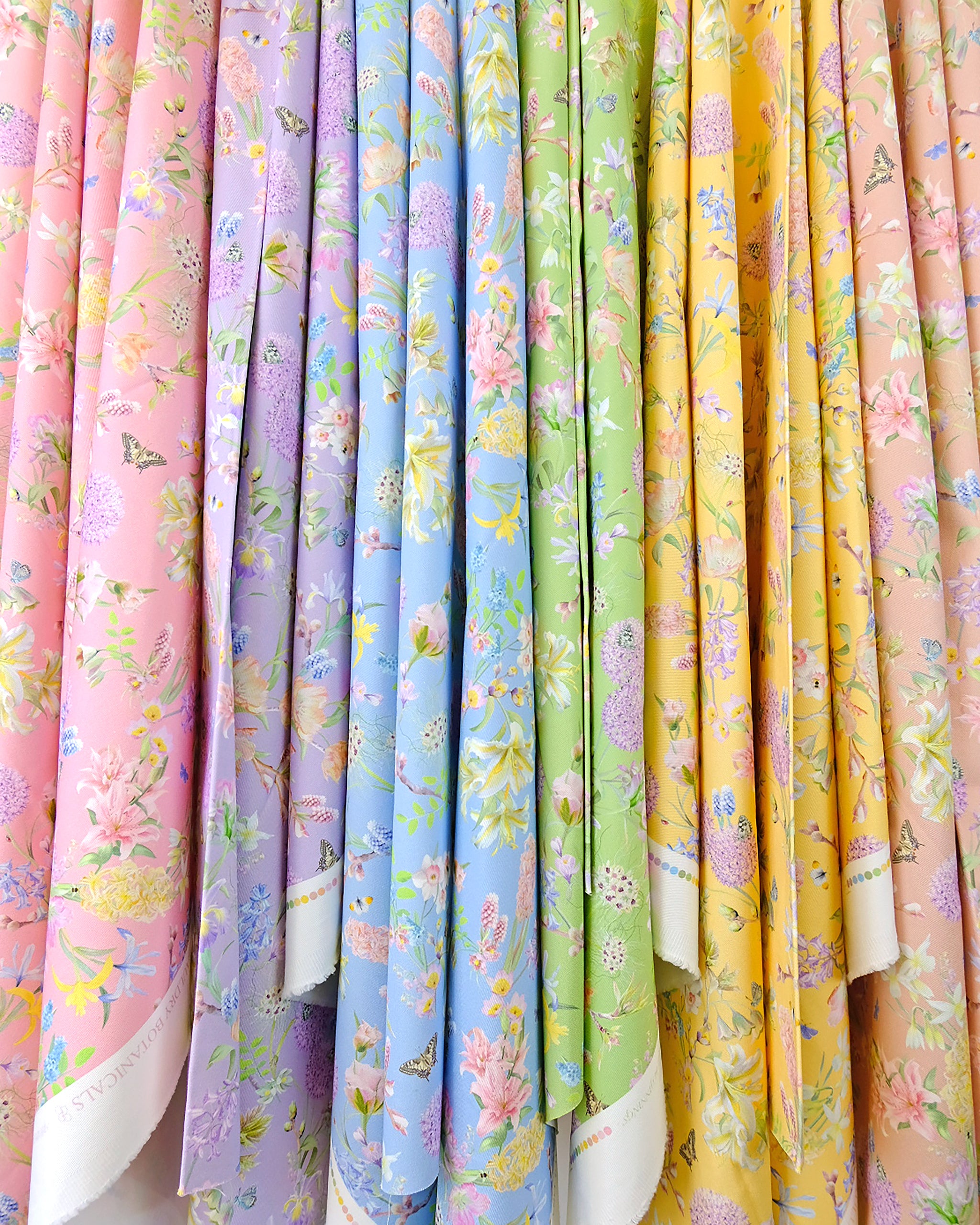 100% organic cotton twill fabric in a luxury delicate botanical pattern for sustainable colourful interiors.