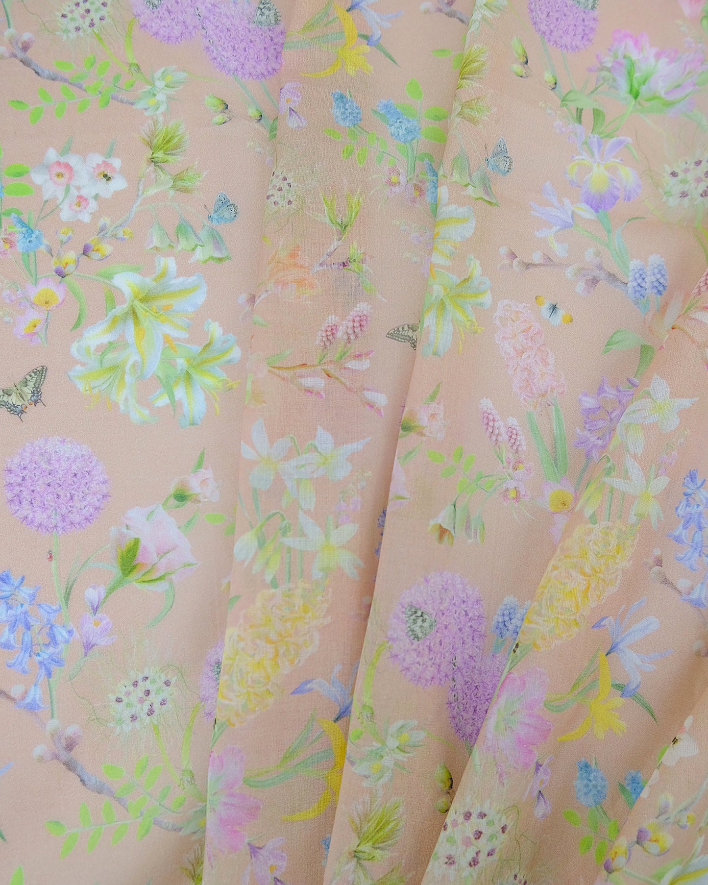 Light weight eco friendly fabric in a luxury floral illustrated pastel peach for colourful window dressings