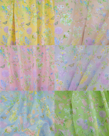 a collection of 100% organic cotton voile fabric for interior curtains in yellow, peach, pink, purple, blue and green.