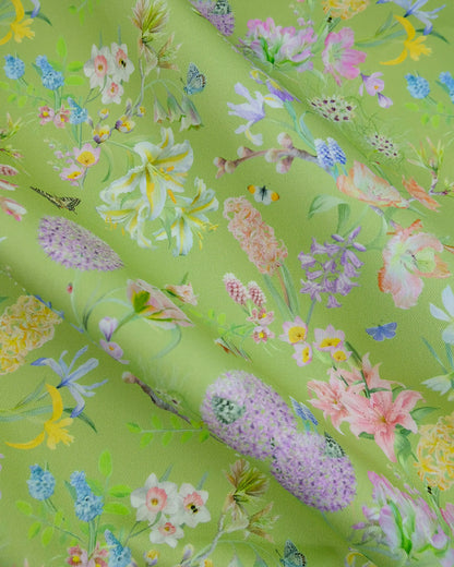 Uplifting conscious material in a soft flowering mint green design for modern soft furnishings and window coverings