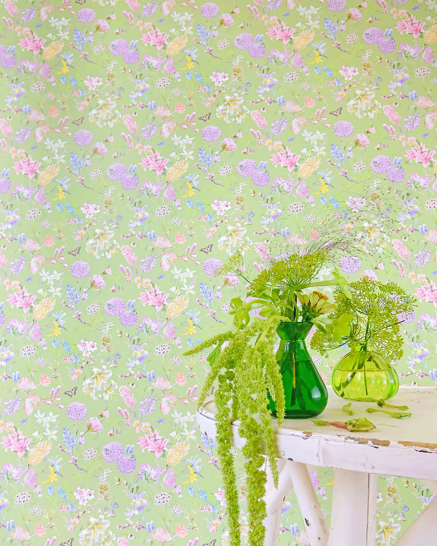 Light green designer wall covering with a hand illustrated nature inspired design for modern home decor