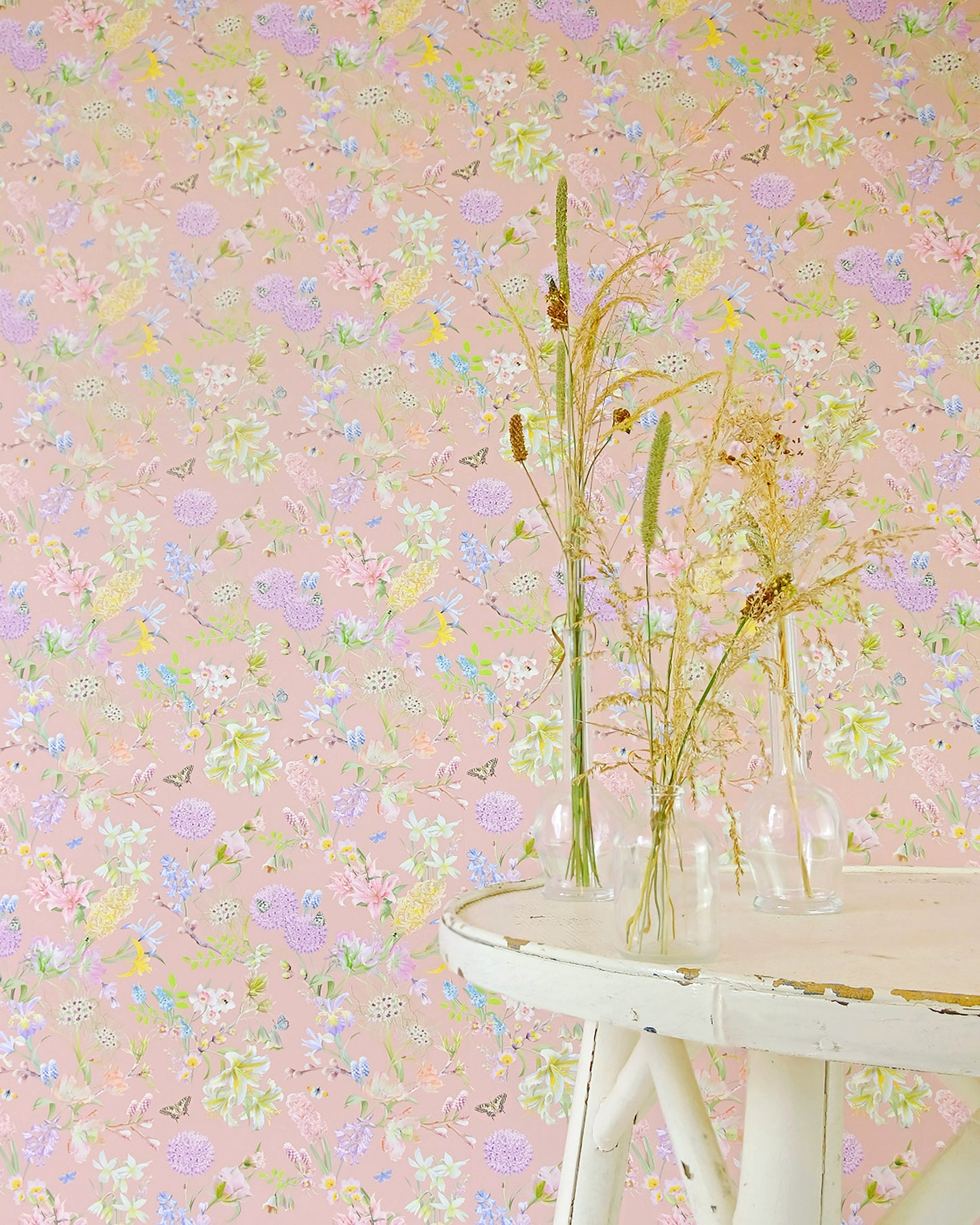 Cream designer wall covering with a hand illustrated nature inspired design for modern home decor
