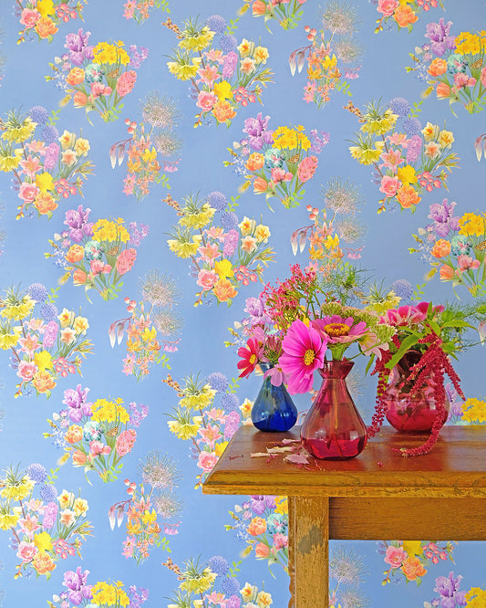 Colourful luxury wallpaper in cornflower blue with a spring floral pattern for traditional cottage interiors