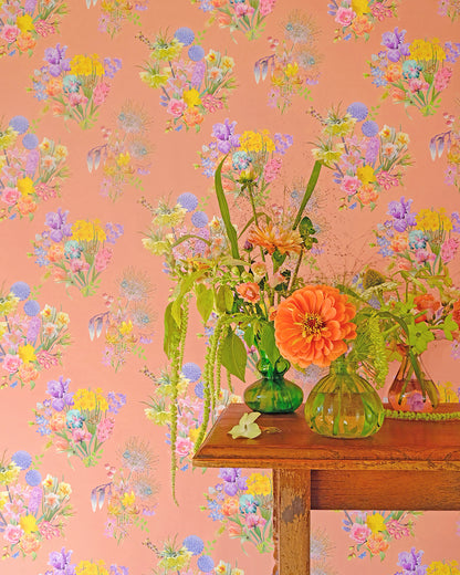 Colourful luxury wallpaper in pale orange with a spring floral pattern for traditional cottage interiors