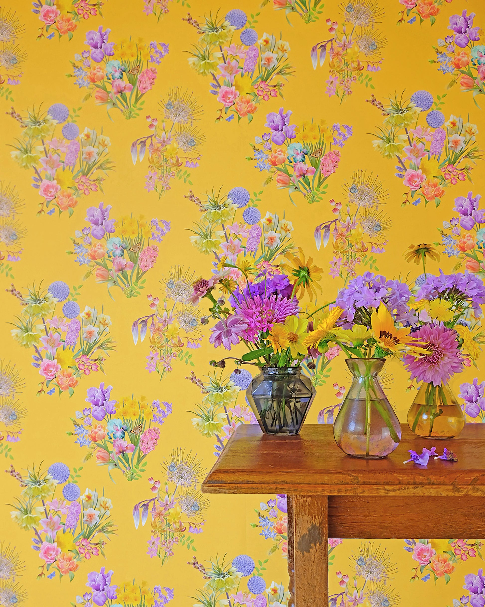 Colourful luxury wallpaper in sunshine yellow with a spring floral pattern for traditional cottage interiors